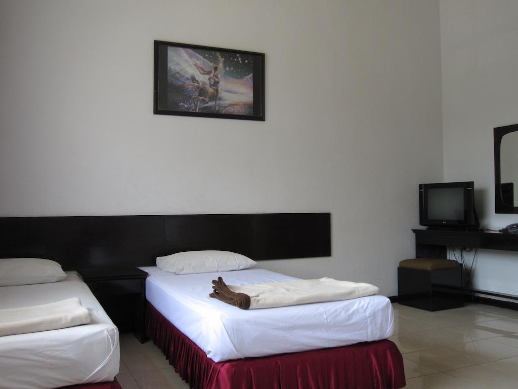 Hotel Santosa Маланг Номер фото
