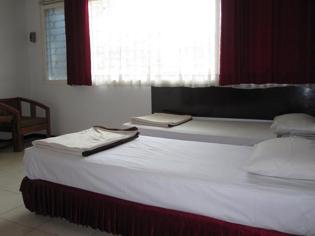 Hotel Santosa Маланг Номер фото