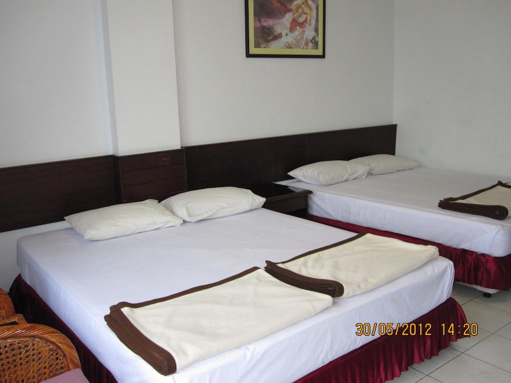 Hotel Santosa Маланг Номер фото