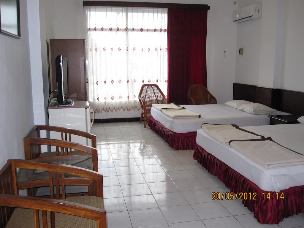 Hotel Santosa Маланг Номер фото